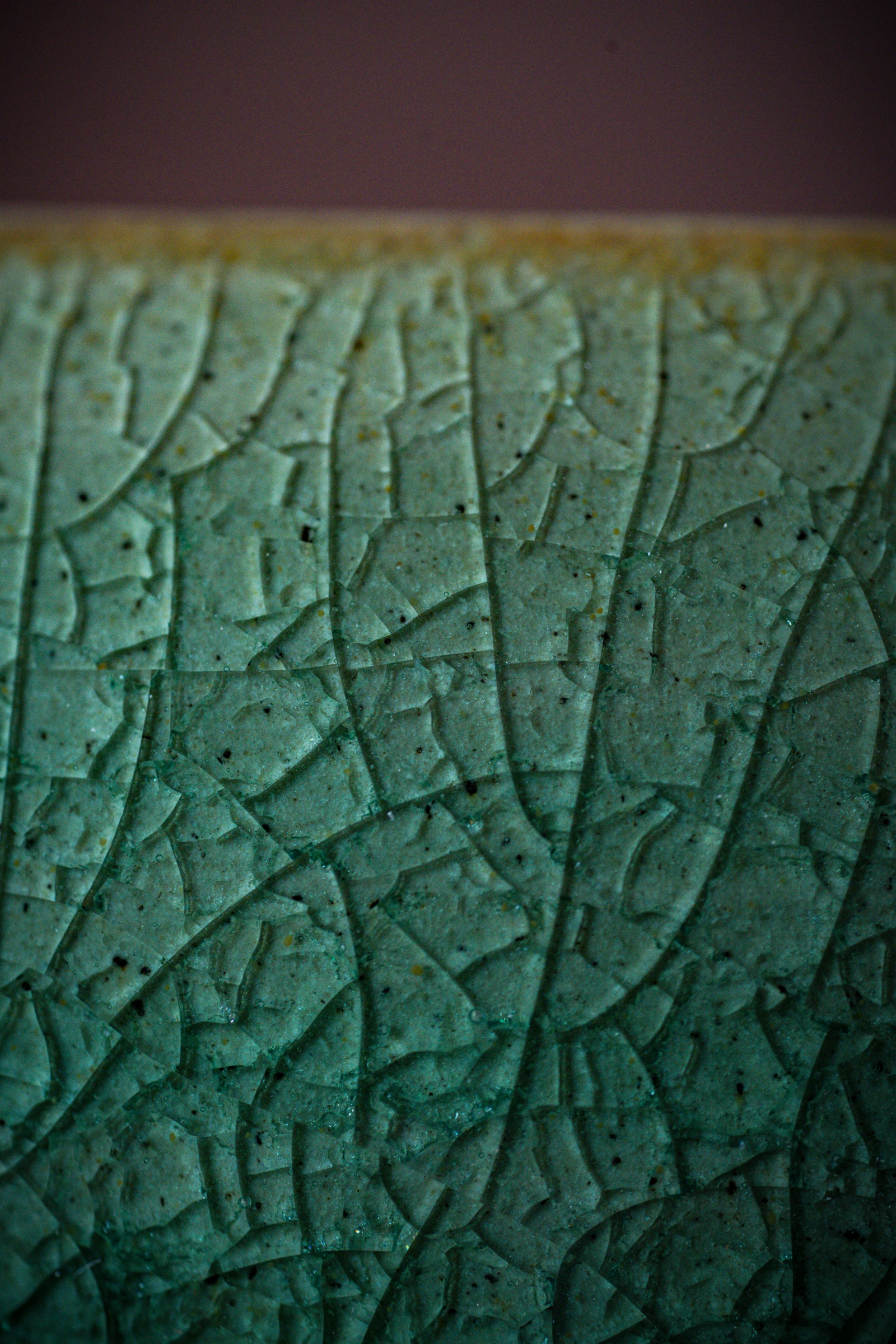 Teal ceramic glaze surface